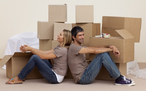 Local moving team handling boxes and fragile belongings in Ardleighgreen