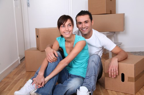 Local moving team handling household items with care