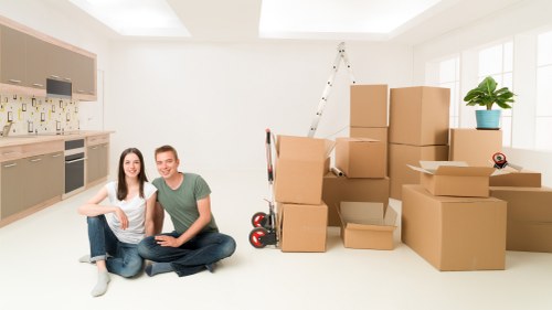 Local moving truck loading household items for an Ardleighgreen move