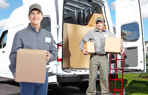 Local moving truck helping with furniture transport and loading in Ardleighgreen