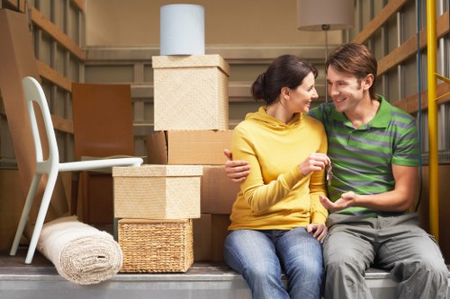 Van and man service pricing based on cubic-yard volume for household items