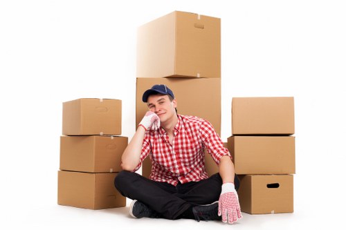 Professional movers loading boxes and furniture safely