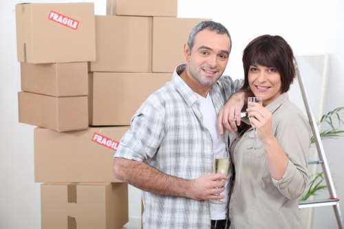 Loading household items into a removal van in Ardleighgreen