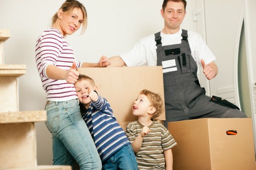 Packed living room ready for professional house removals in Ardleigh Green
